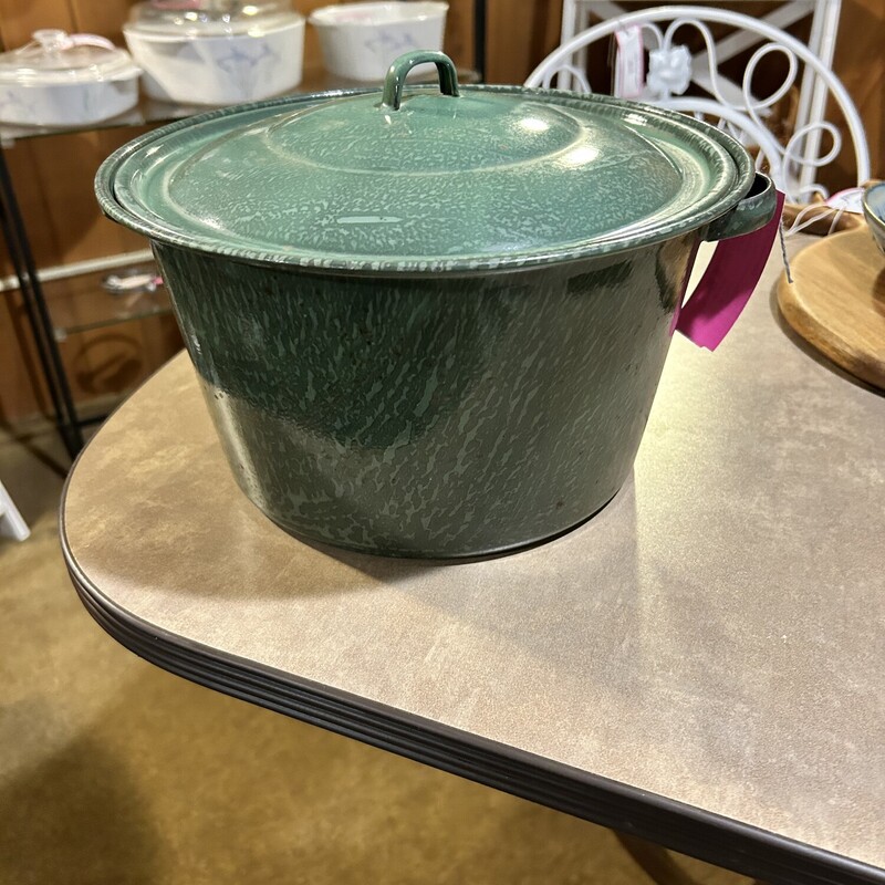 Grn Enamel Pot W/Cover,
 Size: 11x6
Green Enamel pot with a tight fitting cover.  There are one or two marks on the pot but it is in good condition.