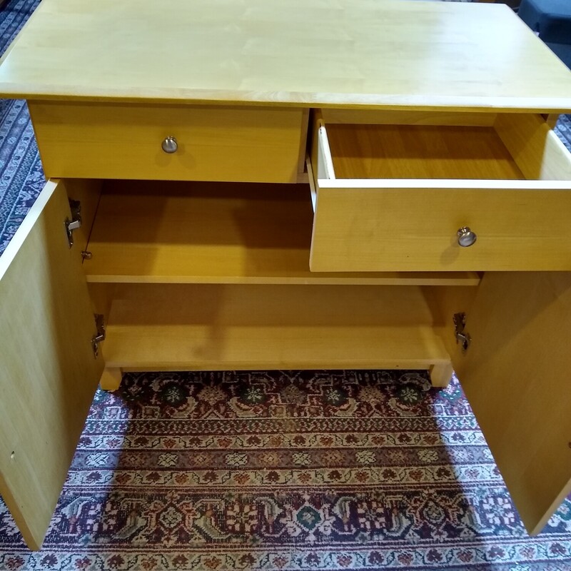 Birch 2 Door Cab W/2 Doors<br />
<br />
Great condition.  Birch cabinet with 2 doors and shelving and 2 drawers.<br />
<br />
Size: 38 in wide X 18 in deep X 31 in high