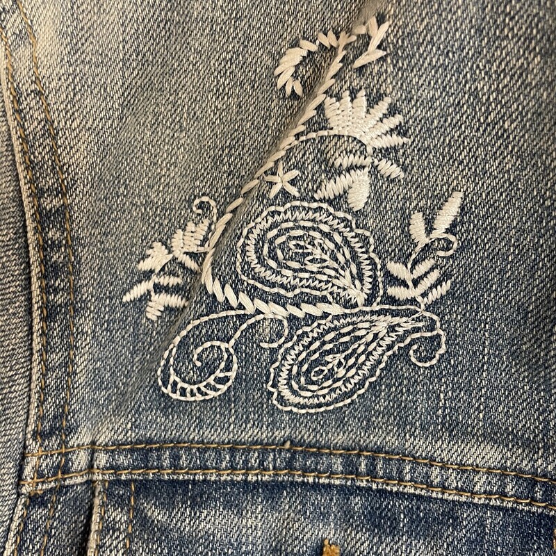 Coldwater Creek light denim jacket. This has cream embroidery on both shoulders and on the back. Size 10/Medium.