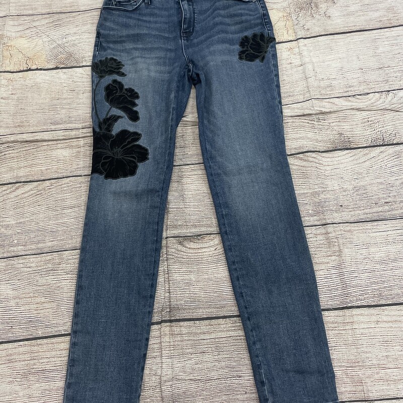 Chicos straight legs jeans wide waist band inside. For more comfort . This has embrodidery velvet flowers on both legs. Size 0/Small