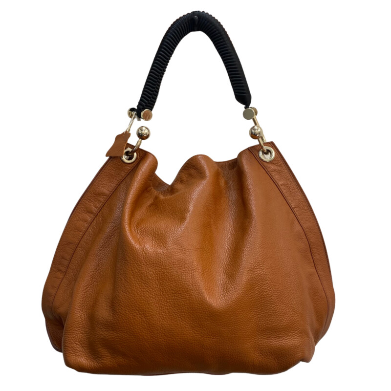 Marni Leather Bag<br />
Designer Label<br />
Super Soft Leather<br />
Black Woven Handle<br />
Artistic Gold Hardware<br />
Color:  Cognac