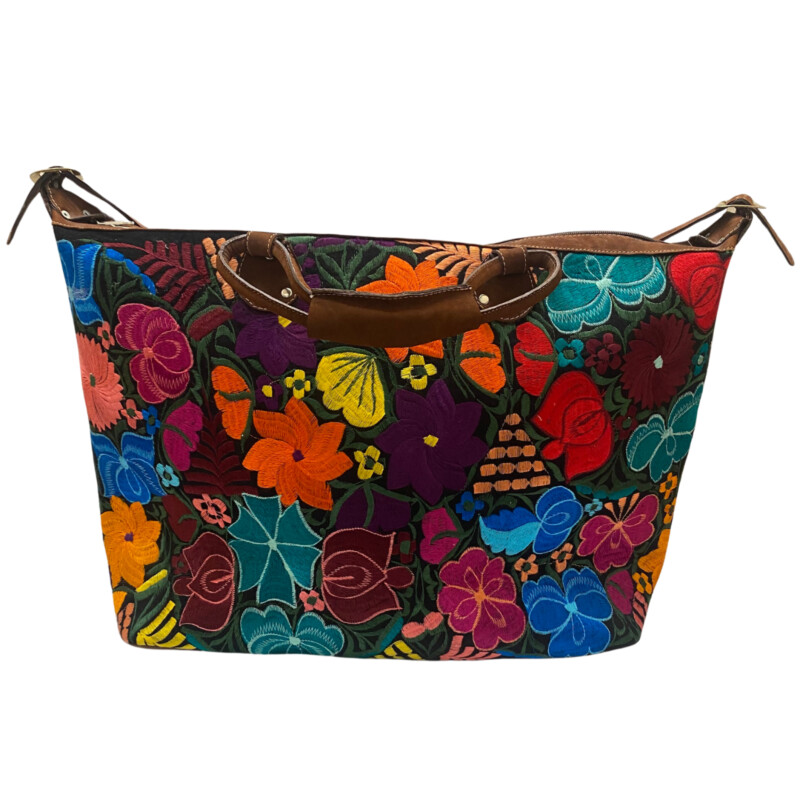 Guatemalan Embroidered Floral Tote<br />
Gorgeous Colors!<br />
Handles and Crossbody Strap<br />
Zipper Closure<br />
Large Front Zipper Pocket<br />
Perfect for the Next Trip!