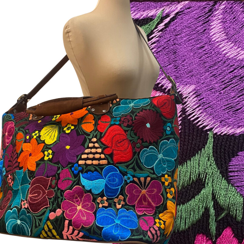 Guatemalan Embroidered Floral Tote<br />
Gorgeous Colors!<br />
Handles and Crossbody Strap<br />
Zipper Closure<br />
Large Front Zipper Pocket<br />
Perfect for the Next Trip!