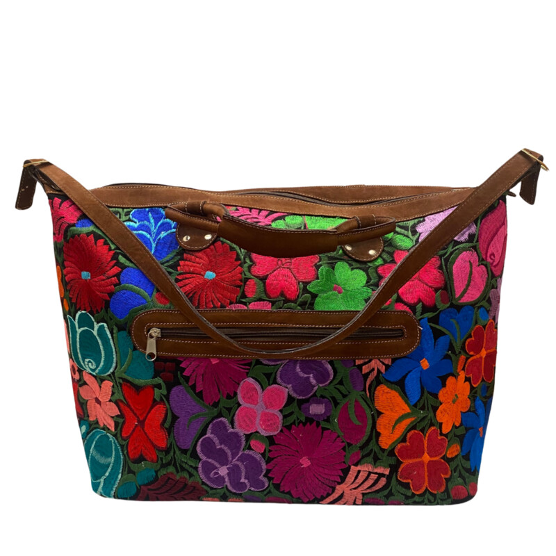 Guatemalan Embroidered Floral Tote<br />
Gorgeous Colors!<br />
Handles and Crossbody Strap<br />
Zipper Closure<br />
Large Front Zipper Pocket<br />
Perfect for the Next Trip!