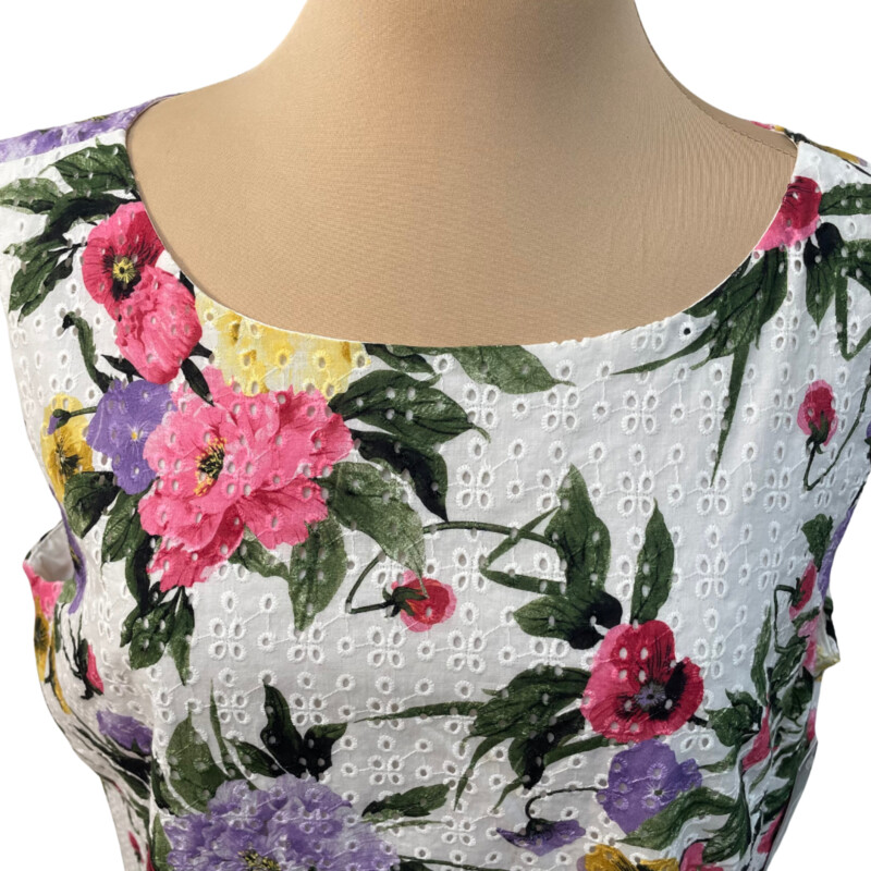 New Tahari Botanical Blooms Eyelet Dress<br />
100% Cotton<br />
Sleeveless with Zipper Back<br />
White with Pink, Purple, Green and Yellow<br />
Size: 16