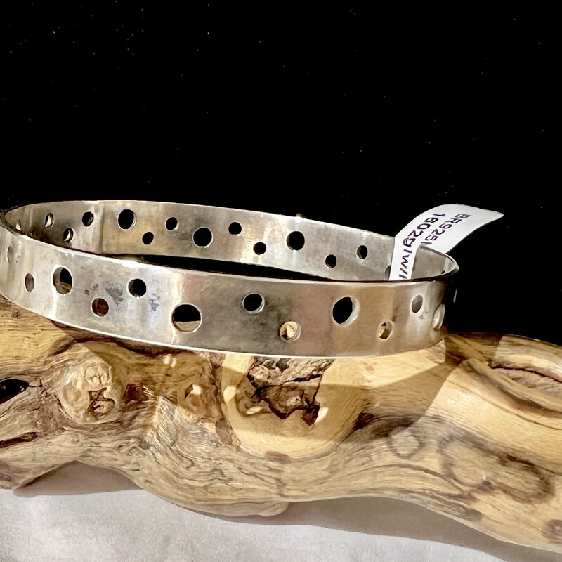 Sterling bangle with holes