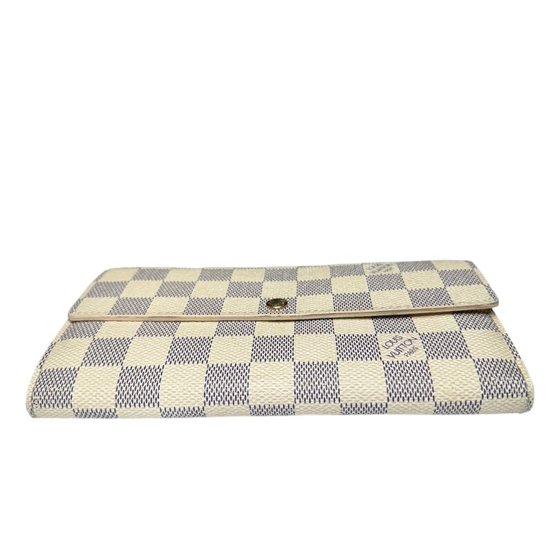 Louis Vuitton Sarah, Damier
Dimensions: 7.5 x 3.9 inches
(length x Height)
Damier Azur coated canvas
Grained cowhide-leather lining
Gold-color hardware
Press-stud closure
2 large gusseted compartments
Zipped coin pocket
Inside flat pocket
Outside flat pocket
16 card slots