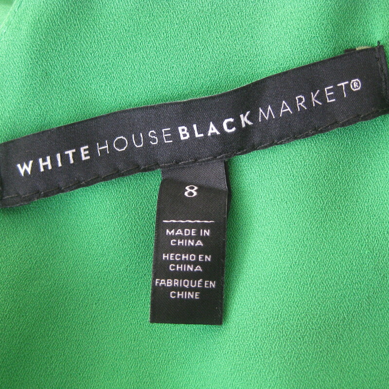 Pretty and feminine easy to wear dress from White House Black Market<br />
Vibrant green with white hibiscus flower print<br />
Perfect for a destination wedding or any summer event.<br />
v-neck with a little mesh extension along the v<br />
sleeveless<br />
sash ties can go in front or back.<br />
deep flounce at hem and uneven shape add to the movement.  Fab for the dance floor<br />
<br />
Size 8<br />
flat measurements:<br />
armpit to armpit: 21<br />
waist: 14.5<br />
hip: 22<br />
length: aprox 54<br />
<br />
thanks for looking!<br />
#77311