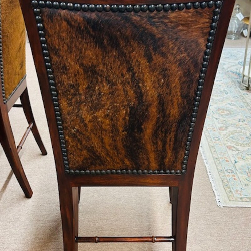 Century Furniture Live Edge Table and  6 Theo Alexander Sweep Cowhide Chairs<br />
<br />
Browns Black Silver Accent Base<br />
Table Size: 80 x 40 x 30H<br />
6 Armless Cowhide Chairs Size: 20 x 24 x 42H<br />
Seat Height: 20H<br />
Retail $19,000 New