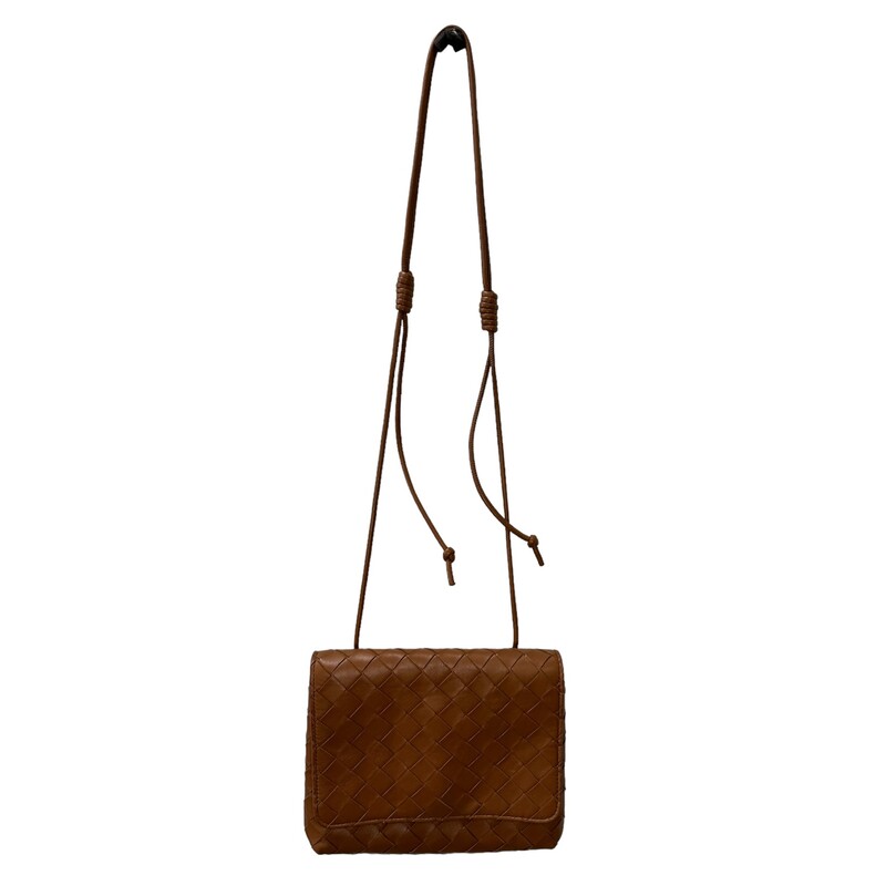 Bottega Veneta Shoulder Bag<br />
Brown Leather<br />
Intrecciato Weave<br />
Gold-Tone Hardware<br />
Single Adjustable Shoulder Strap<br />
Leather Lining & Single Interior Pocket<br />
Flap Closure at Front<br />
Includes Dust Bag<br />
<br />
Dimensions: Shoulder Strap Drop: 25<br />
Height: 6<br />
Width: 7.75<br />
Depth: 2