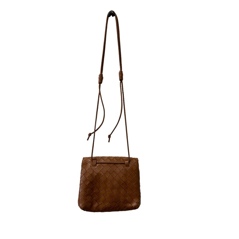 Bottega Veneta Shoulder Bag<br />
Brown Leather<br />
Intrecciato Weave<br />
Gold-Tone Hardware<br />
Single Adjustable Shoulder Strap<br />
Leather Lining & Single Interior Pocket<br />
Flap Closure at Front<br />
Includes Dust Bag<br />
<br />
Dimensions: Shoulder Strap Drop: 25<br />
Height: 6<br />
Width: 7.75<br />
Depth: 2