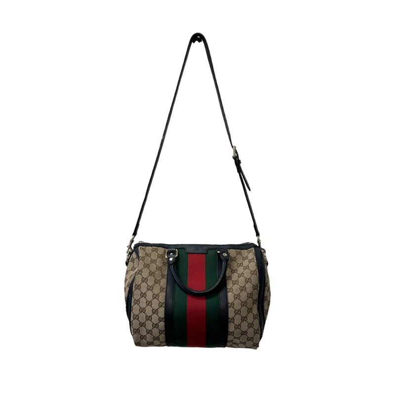 GUCCI Monogram Vintage Web Medium Boston in Dark Brown. This chic vintage style tote is finely crafted of Gucci GG monogram canvas, with a red and green web stripe detail at the center. The bag features rolled top handles, an optional shoulder strap, trim and light brass hardware. The top zipper opens the bag to a natural fiber interior with zipper and patch pockets.

* Interior and coner wear
Base length: 12.25 in
Height: 8.50 in
Width: 7.00 in
Drop: 4.00 in
Drop: 18.50 in

Style Code: 247205