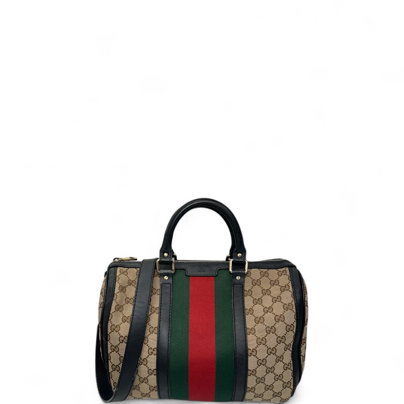 GUCCI Monogram Vintage Web Medium Boston in Dark Brown. This chic vintage style tote is finely crafted of Gucci GG monogram canvas, with a red and green web stripe detail at the center. The bag features rolled top handles, an optional shoulder strap, trim and light brass hardware. The top zipper opens the bag to a natural fiber interior with zipper and patch pockets.

* Interior and coner wear
Base length: 12.25 in
Height: 8.50 in
Width: 7.00 in
Drop: 4.00 in
Drop: 18.50 in

Style Code: 247205