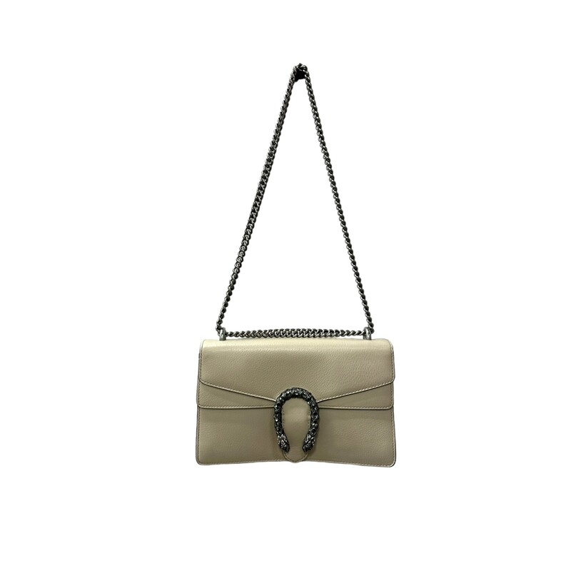 GUCCI Textured Calfskin Crystal Small Dionysus Shoulder Bag in Mystic White. This stylish bag is crafted of textured calfskin leather in white. This shoulder bag features an aged silver chain shoulder strap, and a textured horseshoe closure with lion heads at the end. This opens to a beige fabric interior with a central zipper pocket.<br />
<br />
* Some Sratches on the leather and interior wear and stains.<br />
<br />
Dimensions:<br />
Base length: 10.75 in<br />
Height: 6.75 in<br />
Width: 3.75 in<br />
Drop: 9.00 in<br />
Drop: 15.00 in<br />
<br />
Style Code: 400429