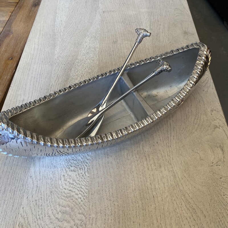 Mariposa Canoe

Size: 14Lx5W

Mariposa Canoe Server and Spreaders by artist Michael Updike.Canoe measures 14 in length, 5 across and 2 1/4 high. The oar shaped spreaders are 8 1/2 long.Hand cast in aluminum and polished to a beautiful finish, this serving piece will look great at your next get together.