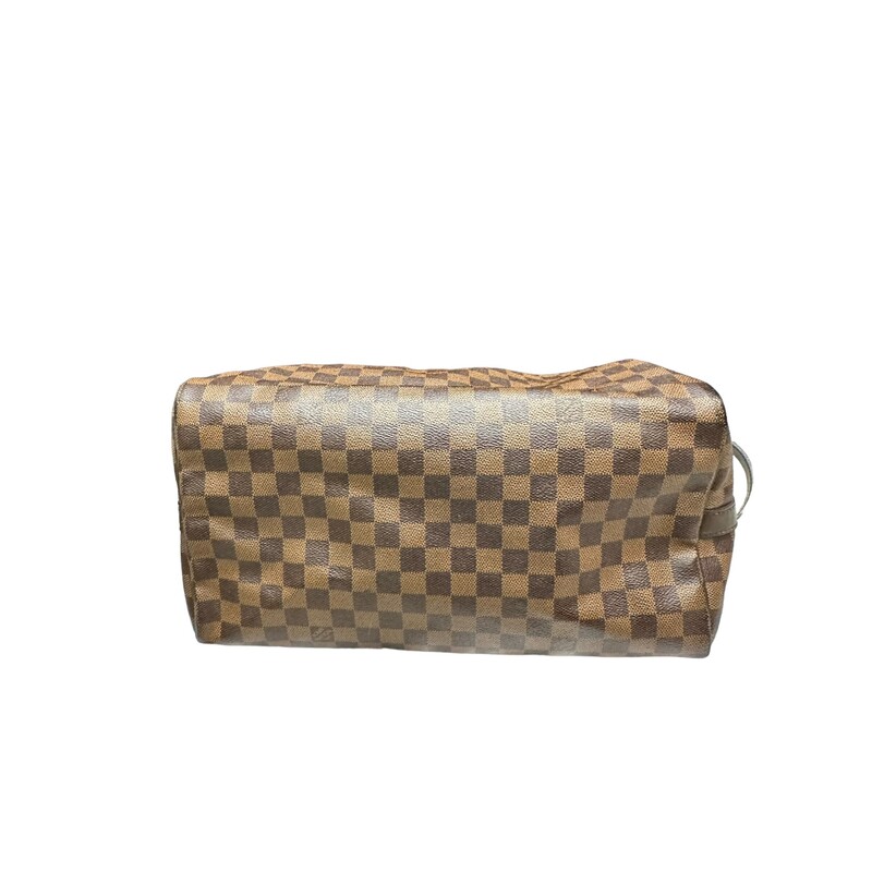 Louis Vuitton Bandouliere Speedy 35 Ebene

Date Code: SD 0175

Dimensions:

Note: Cracking by the zipper pull.