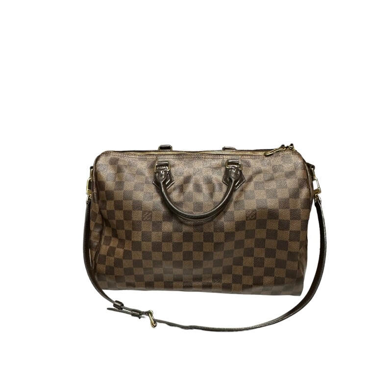 Louis Vuitton Bandouliere Speedy 35 Ebene<br />
<br />
Date Code: SD 0175<br />
<br />
Dimensions:<br />
<br />
Note: Cracking by the zipper pull.