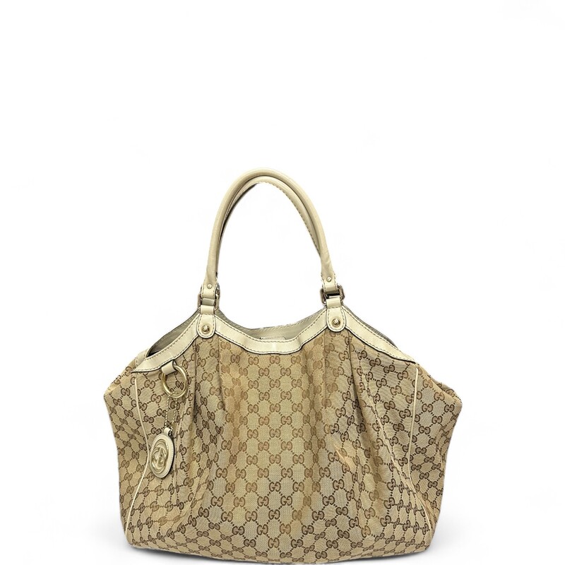 Gucci GG Sukey Hobo Cream Tote

Style Code: 211948

Dimensions:
Base Length: 16.25in
Height: 14.5 in
Width: 5.5 in
Strap Drop: 7in

Includes Dust Bag

Note: Vintage smell to the bag.