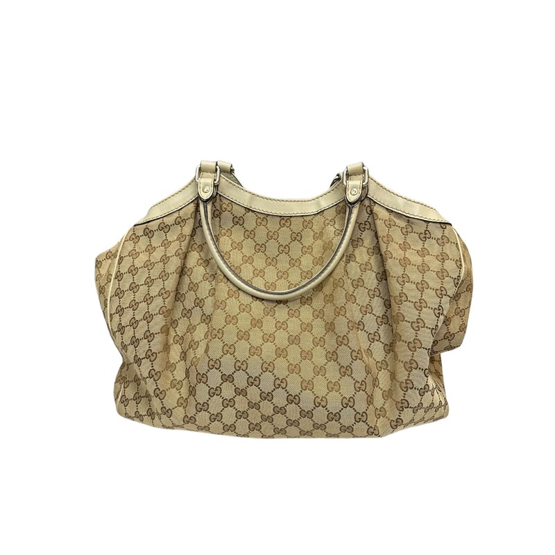 Gucci GG Sukey Hobo Cream Tote<br />
<br />
Style Code: 211948<br />
<br />
Dimensions:<br />
Base Length: 16.25in<br />
Height: 14.5 in<br />
Width: 5.5 in<br />
Strap Drop: 7in<br />
<br />
Includes Dust Bag<br />
<br />
Note: Vintage smell to the bag.