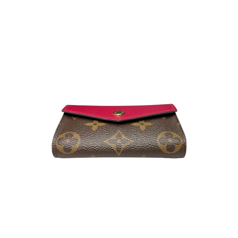 Loui Vuitton Zoe Wallet<br />
3.7 x 3 x 1.2 inches<br />
(length x Height x Width)<br />
Monogram coated canvas and cowhide leather in pale-pink Rose Ballerine<br />
Grained cowhide-leather lining<br />
Gold-color hardware<br />
4 card slots<br />
1 flat back pocket<br />
1 zipped coin pocket<br />
Code:SP1137<br />
Press-stud closure