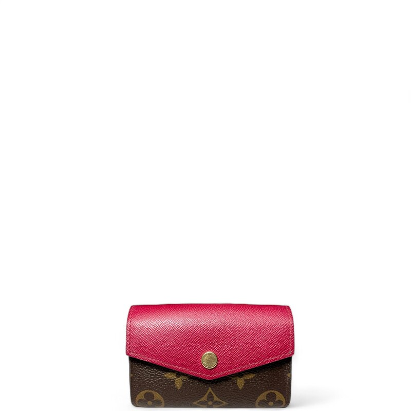 Loui Vuitton Zoe Wallet
3.7 x 3 x 1.2 inches
(length x Height x Width)
Monogram coated canvas and cowhide leather in pale-pink Rose Ballerine
Grained cowhide-leather lining
Gold-color hardware
4 card slots
1 flat back pocket
1 zipped coin pocket
Code:SP1137
Press-stud closure