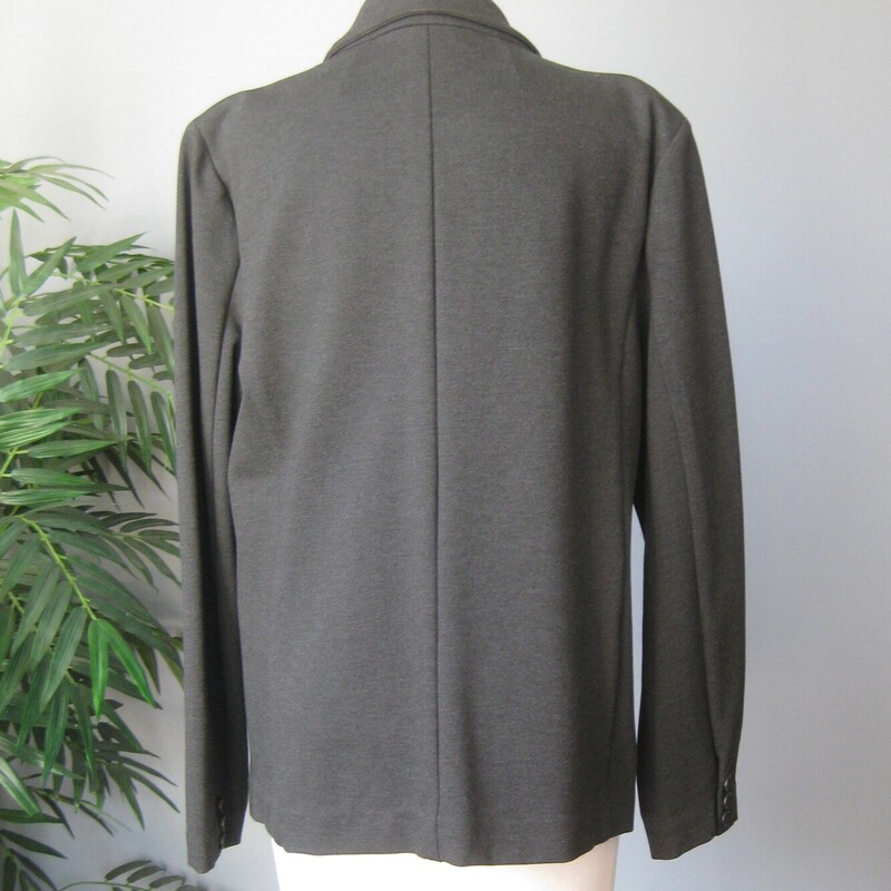 J Crew Knit Stretchy, Gray, Size: 16<br />
Professional structured look but comfortable and easy to wear because of the knit fabric<br />
A classic charcoal gray blazer from J Crew<br />
Single breasted, one button<br />
73 Viscose, 23% polyester, 4% elastane<br />
dark charcoal, the natural light was very strong the day I took these photos, the jacket is darker gray, almost black in person.<br />
unlined with beautifully finished Hong Kong seams inside<br />
Size 16<br />
flat measurements:<br />
shoulder to shoulder: 16.5<br />
armpit to armpit: 22<br />
waist area: 22<br />
width at hem: 25<br />
length: 28.5<br />
underarm sleeve seam length: 19.5<br />
<br />
like new condition<br />
<br />
Thanks for looking!<br />
#69256