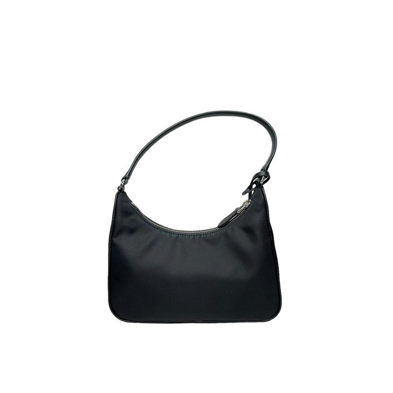 Prada Nylon ReEdition 2000s Mini Bag Black<br />
<br />
Dimensions:<br />
Height: 17cm<br />
Width: 22cm<br />
Length: 6cm<br />
<br />
Factory Code:<br />
25/G<br />
<br />
Comes with box and dust bag.