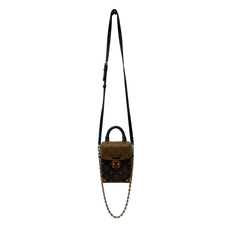 Louis Vuitton Camera Box Chain Bag<br />
Date Code: Microchip<br />
Monogram and Monogram Reverse coated canvas<br />
Cowhide-leather trim<br />
Microfiber lining<br />
Gold-color hardware<br />
Flap closure with S-lock<br />
Inside back flat pocket<br />
Strap:Removable, adjustable<br />
Strap drop:19.3 inches<br />
4.9 x 6.9 x 2.4 inches<br />
(length x Height x Width)<br />
* Some minor stratches on hardware<br />
*Comes with box and dust bag