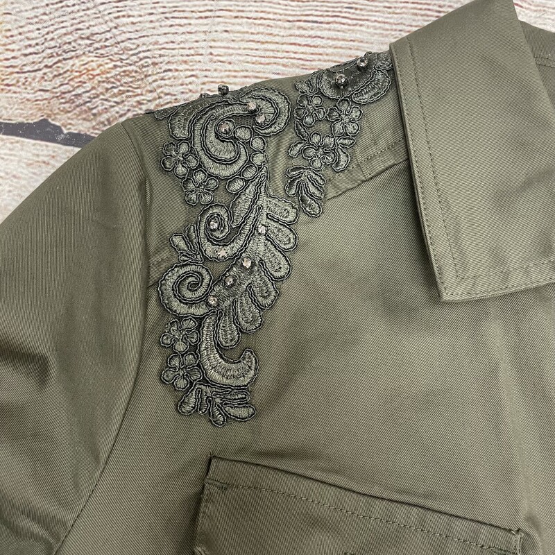 Chicos olive green long sleeve light weight jacket with embroidery flower patch and silver beads on the shoulder button up the front size small