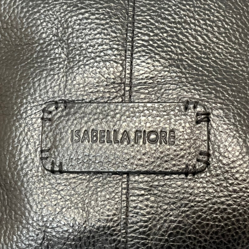 Isabella Fiore Leather Handbag<br />
Lazer Cut Out Pattern<br />
Inside Pockets<br />
Inside Zipper Pocket<br />
Magnetic Closure<br />
Color: Black