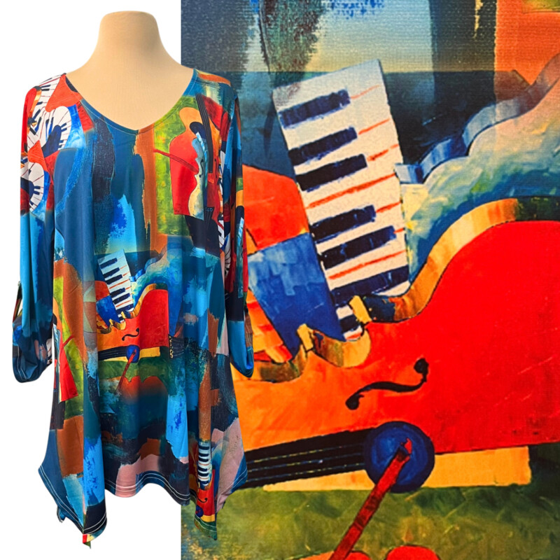 NEW Lior Paris Tunic Top
Musical Backdrop Design
Roll Tab Sleeves
Teal, Red, Yellow and Other Happy Colors
Size: Large