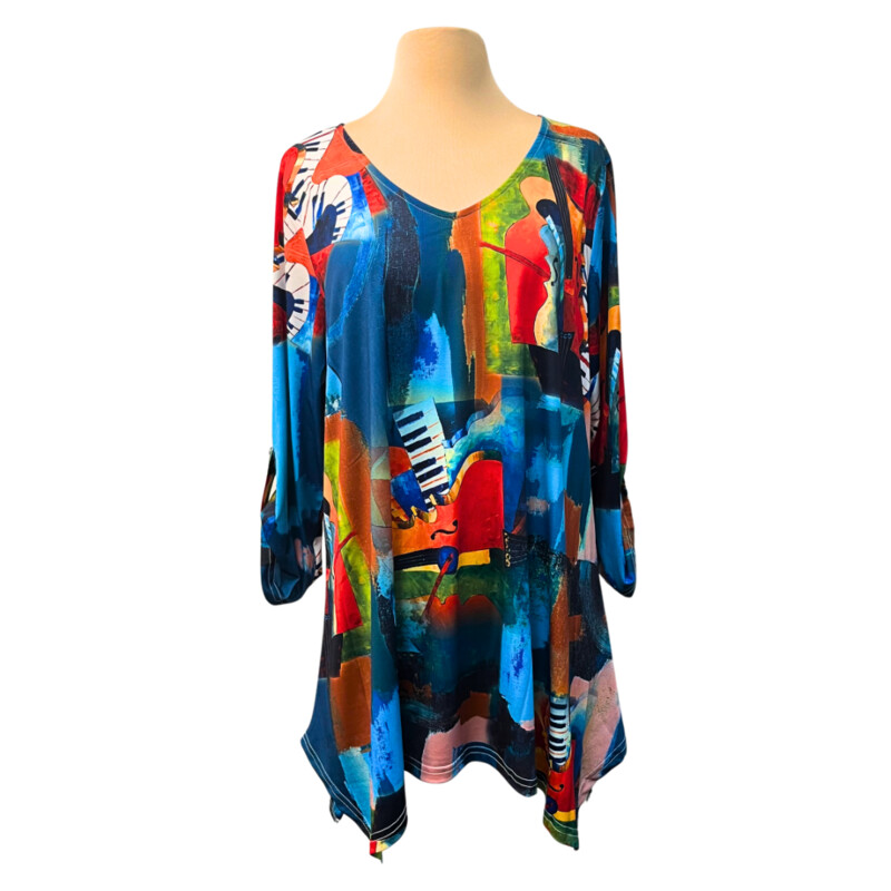 NEW Lior Paris Tunic Top
Musical Backdrop Design
Roll Tab Sleeves
Teal, Red, Yellow and Other Happy Colors
Size: Large