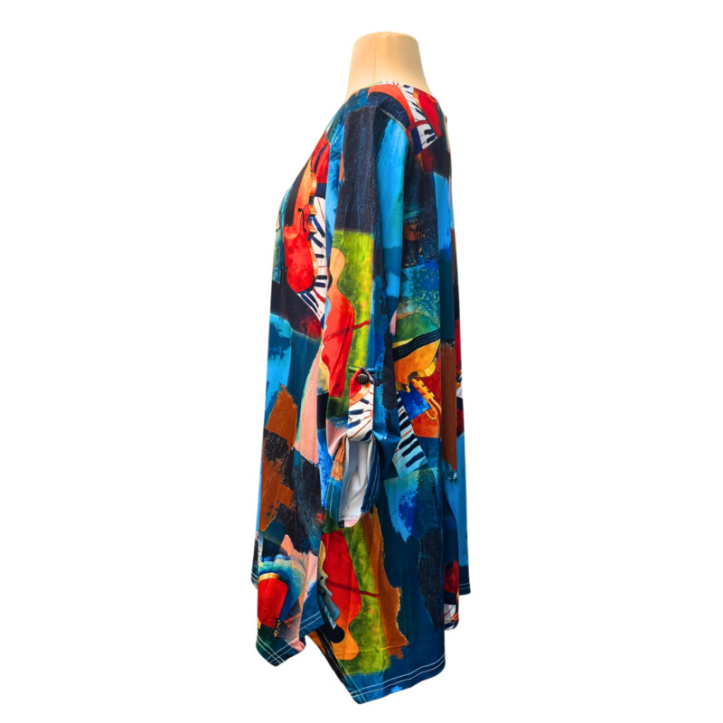 NEW Lior Paris Tunic Top
Musical Backdrop Design
Roll Tab Sleeves
Teal, Red, Yellow and Other Happy Colors
Size: Large