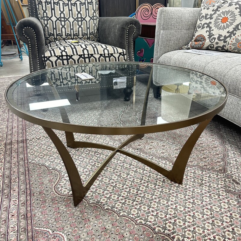 Circle Furniture Round Glass Coffee Table, retails for $1,740! Heavy metal base with round glass top.
Size: 36in W