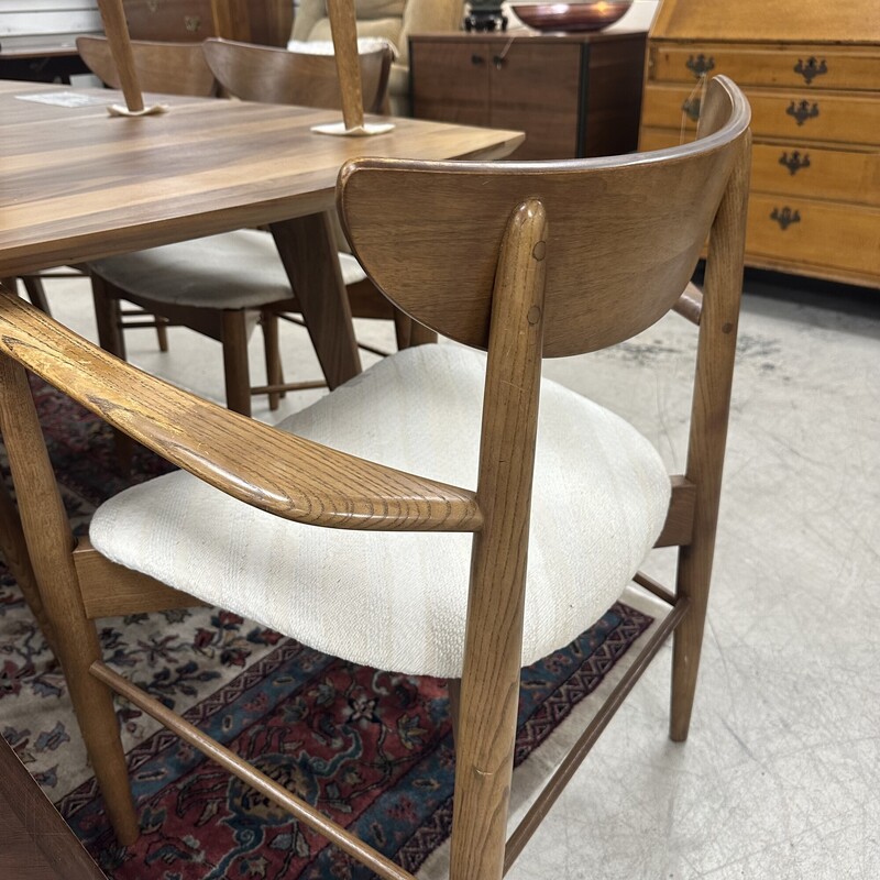 Mid Century Modern Dining Chairs, sold as a set of 8. Brown Frame with reupholstered seats. In great shape for their vintage age.