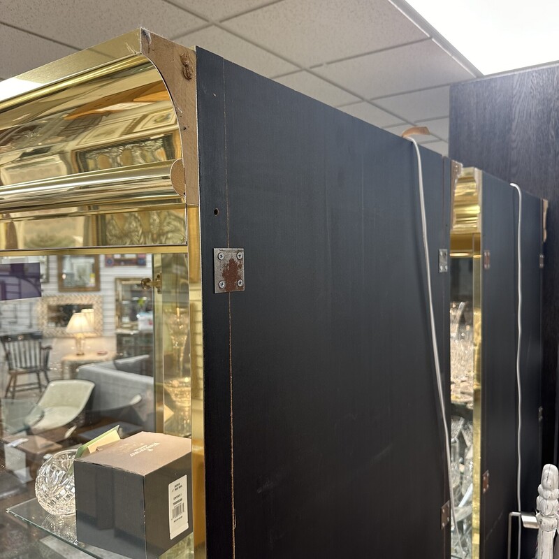 Mid Century Modern/Art Deco Ello Brass Display Case, Brass. Huge! Glass doors, glass shelves. We have two of these while supplies last.
Size: 82x38x21