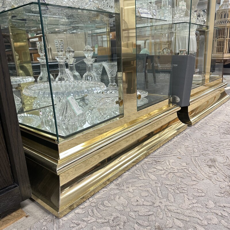 Mid Century Modern/Art Deco Ello Brass Display Case, Brass. Huge! Glass doors, glass shelves. We have two of these while supplies last.
Size: 82x38x21