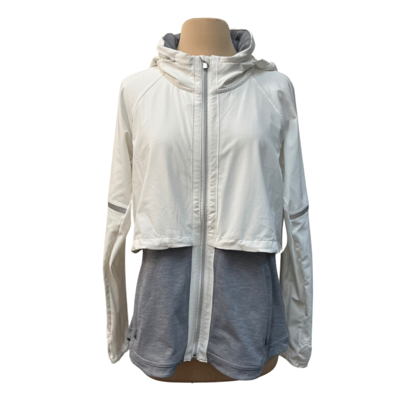 Athleta Quick Step Runners Reflective Jacket<br />
Zip up, reflective stripe, adjustable hood that can be hidden, inner and outer pockets, adjustable crop layer, sleeve over hand with thumb hole, air mesh on sleeves.<br />
Colors: White & Gray<br />
Size: Large