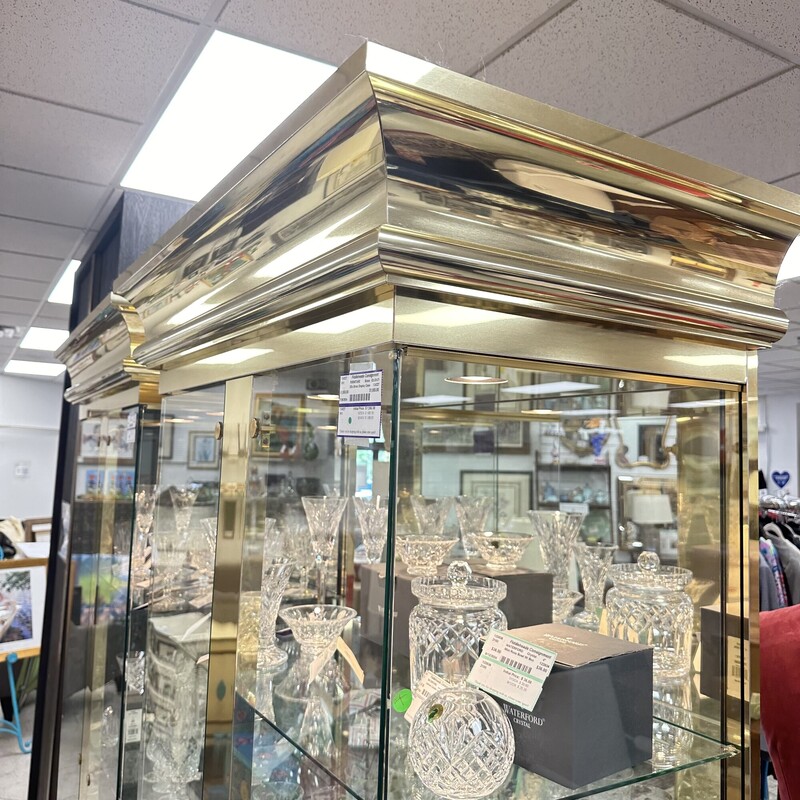 Mid Century Modern/Art Deco Ello Brass Display Case, Brass. Huge! Glass doors, glass shelves. We have two of these while supplies last.<br />
Size: 82x38x21