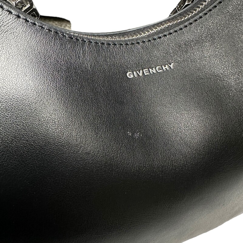 Givenchy Moon Cut Out, Black, Size: Small<br />
<br />
Style Code: GA N 1212<br />
<br />
Note: Part of the zipper pull is missing.<br />
Small mark shown in photo