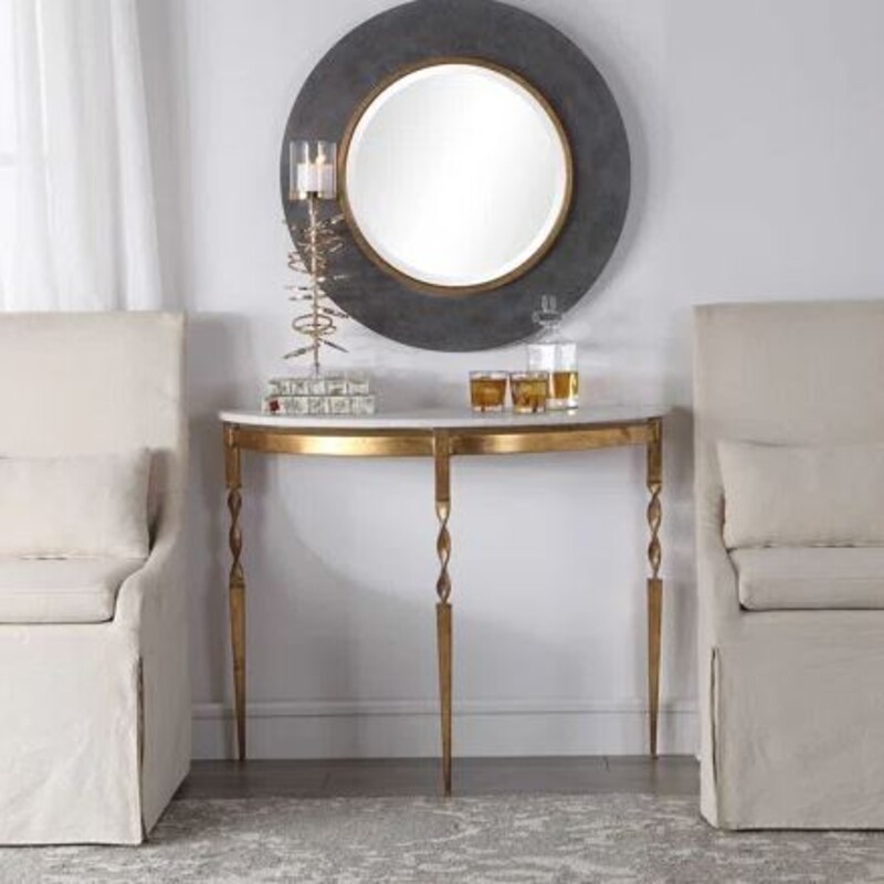 Uttermost Imelda Console Table
White Gold Size: 40 x 16 x 31H
Retails: $979.00
Elegant in design, this demilune console table features a polished marble top
The solid cast iron base is accented with twist details and tapered legs in a heavily antiqued finish
Requires easy assembly upon arrival