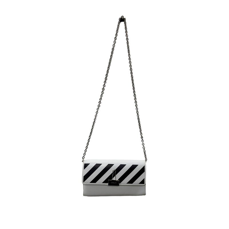 Off White Striped Binder, White, Size: 0S
· Detachable chain-link shoulder strap with post-stud fastening
· Signature binder clip hardware and signature stripes bonded in black at face
· Logo stamp in black at back face
· Foldover flap with magnetic press-stud fastening
· Patch pocket, zip pocket, and four card slots at interior
· Leather lining in black
· Silver-tone hardware
· H5 x W9.5 x D2 in

Dust bag included.