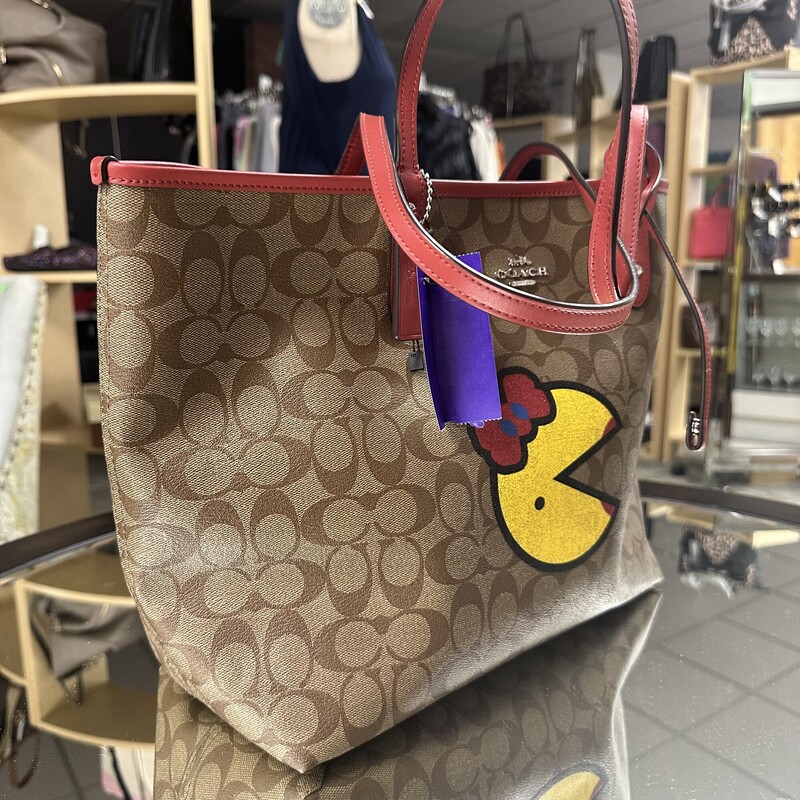 Coach Reversible City Tote, from the PacMan Series<br />
Size: 17x11