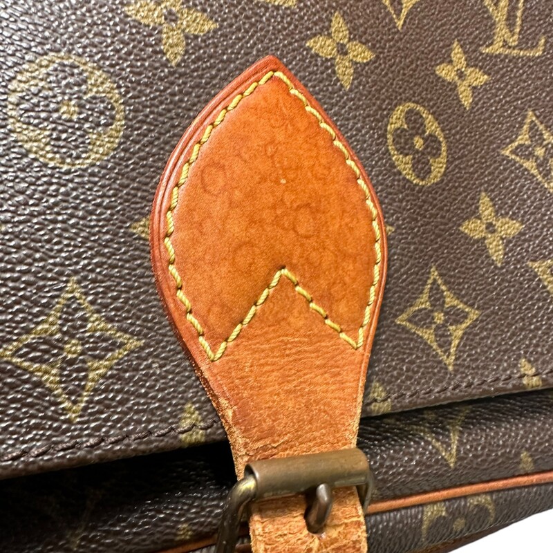 Louis Vuitton Cartouchier 26 Monogram<br />
<br />
Date Code:SL0960<br />
<br />
Dimensions:<br />
Base length: 9.75 in<br />
Height: 8.5 in<br />
Width: 3 in<br />
Drop: 21 in<br />
<br />
Note: Leather is stained and stiff through out the bag.