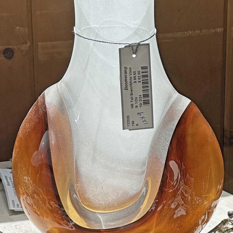 Signed Hand Blown Brown and White Glass Vase
12 In Tall x 9 In Wide.