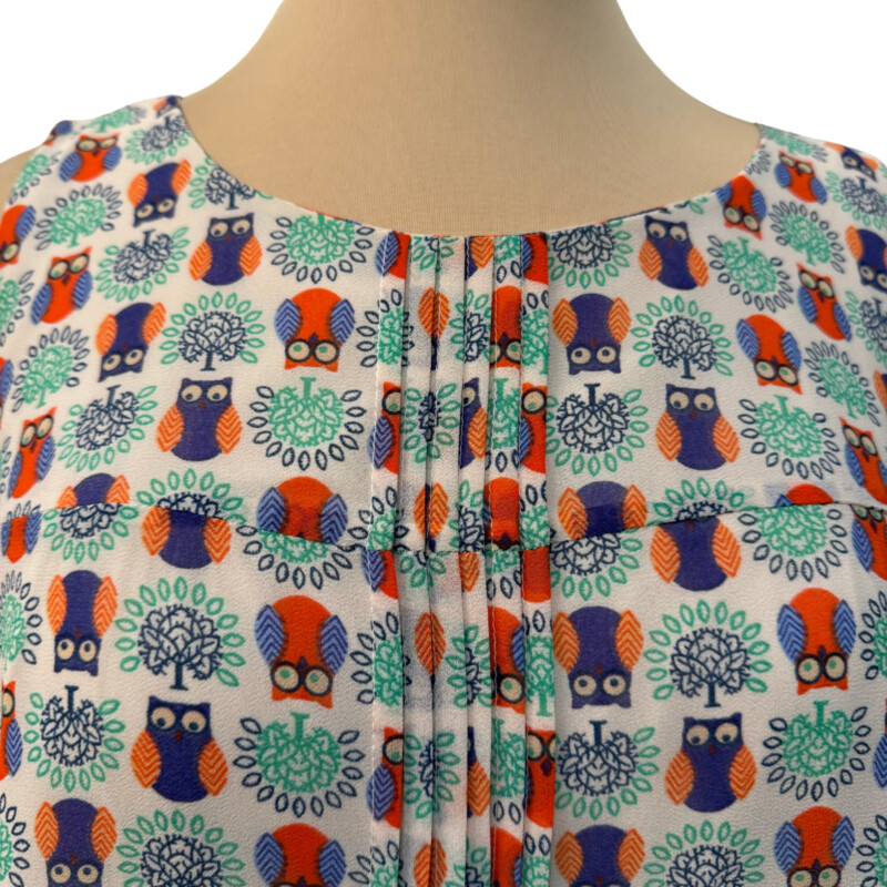 Eshakti Custom Owl Print Top<br />
Cute Button Back Detail<br />
Pleated Front<br />
Sleeveless<br />
Fully Lined<br />
Cream, Orange, Green, Navy, Blue, and Peach<br />
Size: Large