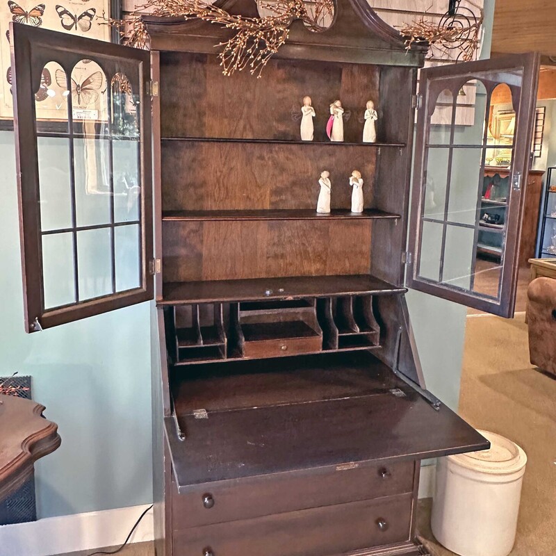 Mahogany Secretary Desk<br />
<br />
Secretary desk with glass doors and 3 drawers. Inside drop down has cubbies and a small drawer.<br />
<br />
Size: 31 in wide X 15 in deep  X 77 in high<br />
Drop down desk open is 27 in deep.