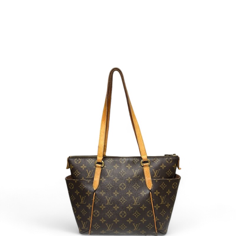 Louis Vuitton Totally PM Monogram

Date Code: TJ4183

Dimensions:
Base length: 10.75 in
Height: 10 in
Width: 4 in
Drop: 9.25 in

Note: Wear to the leather trim. Some of the leather has come off.