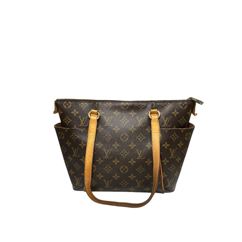 Louis Vuitton Totally PM Monogram<br />
<br />
Date Code: TJ4183<br />
<br />
Dimensions:<br />
Base length: 10.75 in<br />
Height: 10 in<br />
Width: 4 in<br />
Drop: 9.25 in<br />
<br />
Note: Wear to the leather trim. Some of the leather has come off.