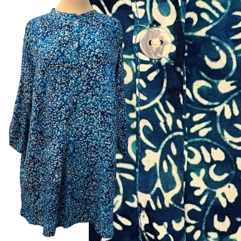 Betty Lous Tunic Top
Batik Swirl Print
Roll-Tab Sleeve
Hi-Lo
Color: Blues and White
Size: L/XL
100% Rayon